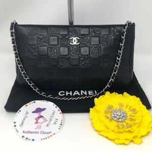 CHANEL Lambskin Precious Symbols Pochette Black